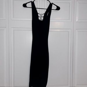 Black mini dress with gold corset back